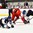 GRAND FORKS, NORTH DAKOTA - APRIL 14: Finland's Eetu Tuulola #19, Robin Salo #4, and Czech Republic's Matyas Kantner #27 collide during preliminary round action at the 2016 IIHF Ice Hockey U18 World Championship. (Photo by Matt Zambonin/HHOF-IIHF Images)

